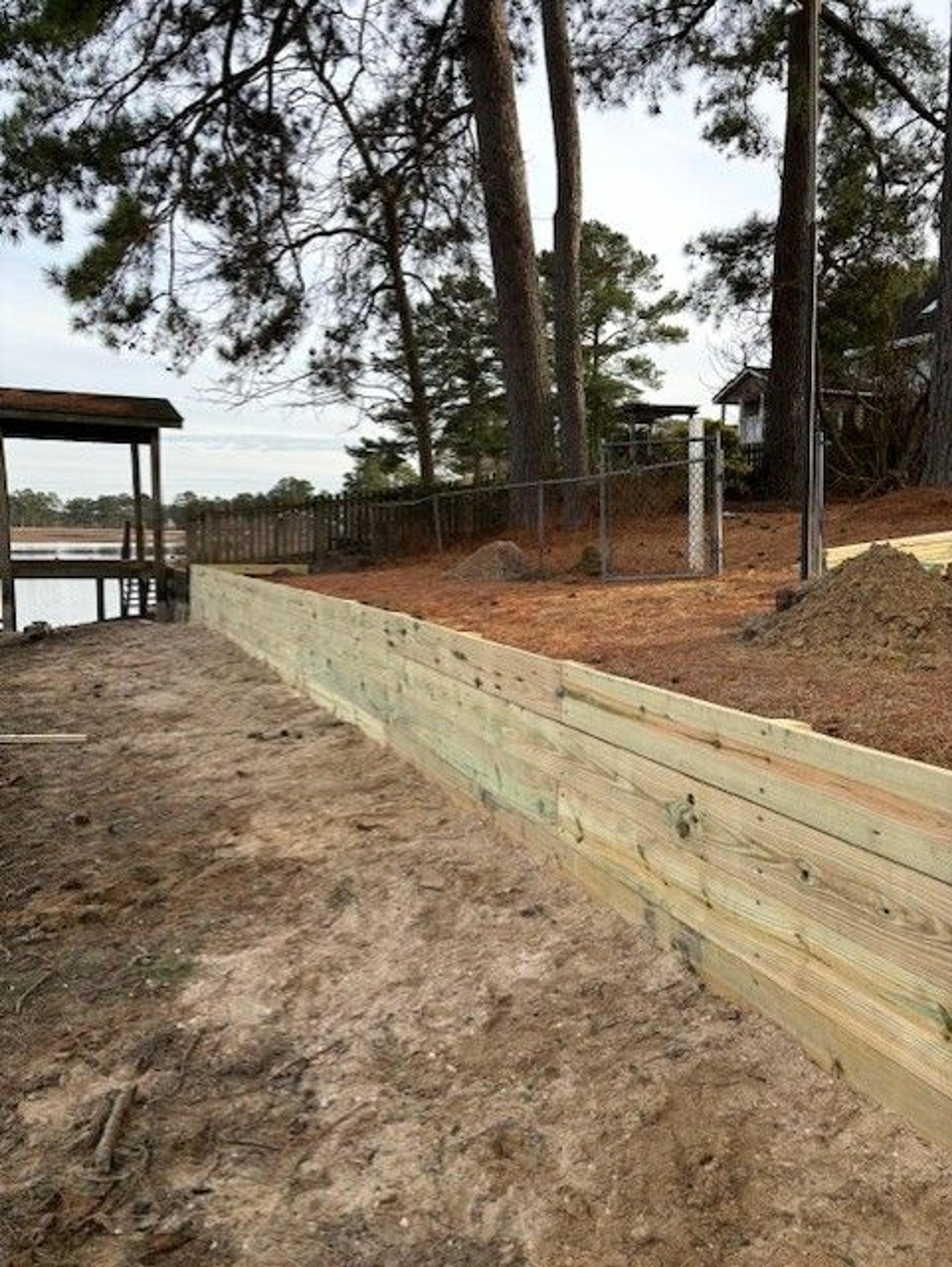 Shoreline Stabilization With Boardwalk And Boat Shelter