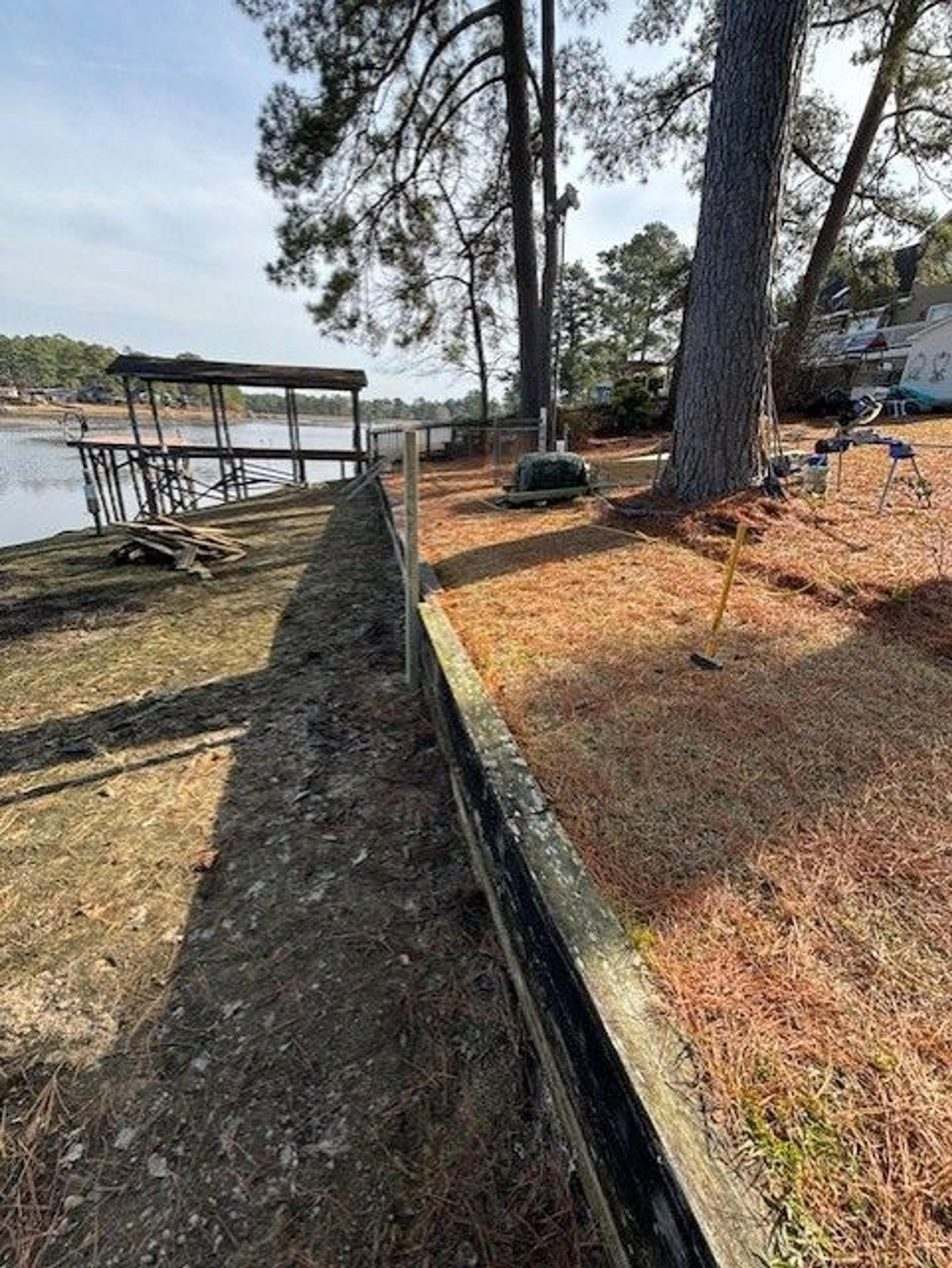 Shoreline Stabilization With Boardwalk And Boat Shelter