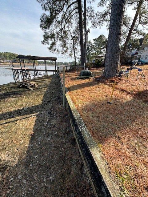 Shoreline Stabilization With Boardwalk And Boat Shelter