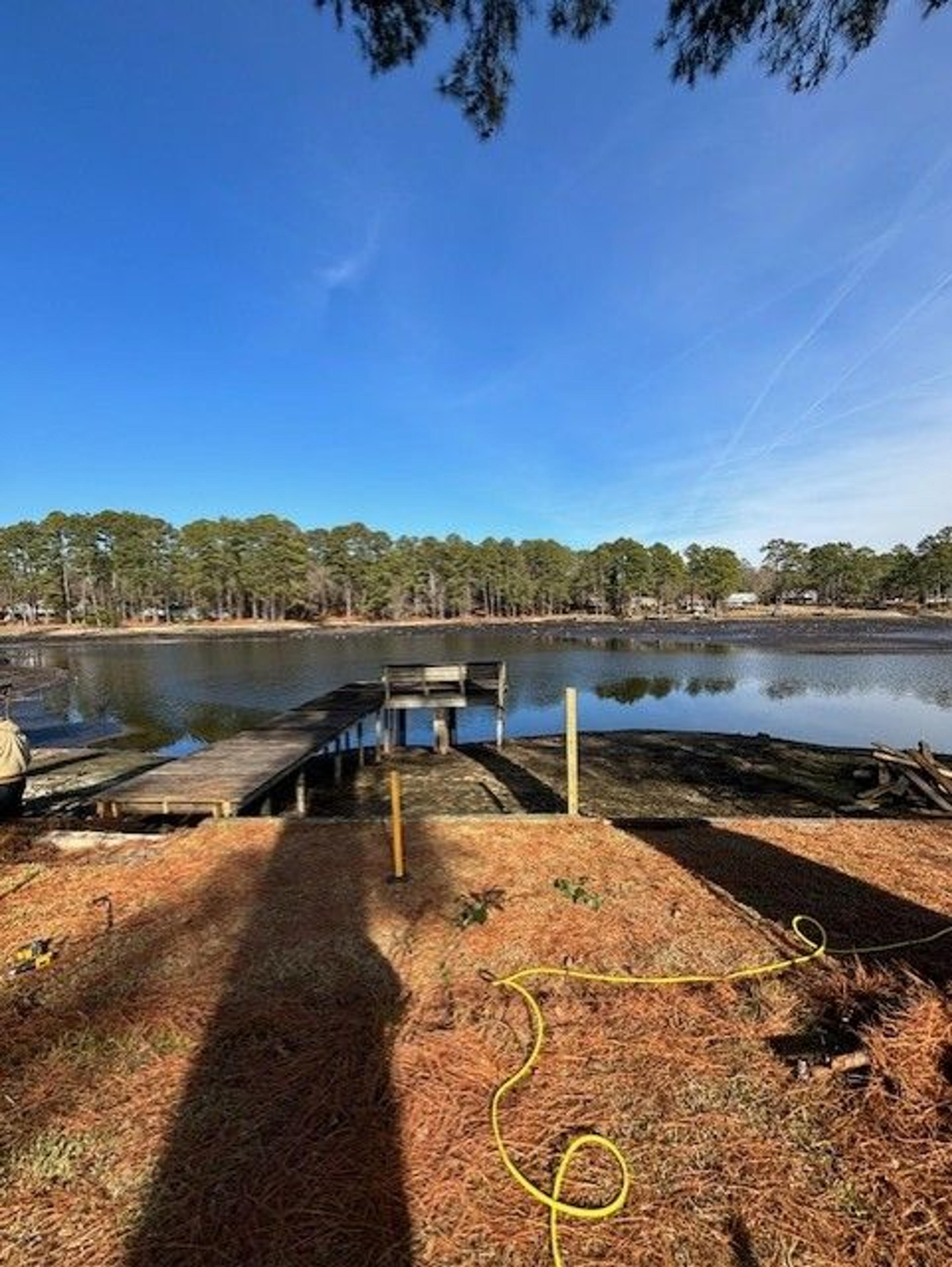 Shoreline Stabilization With Boardwalk And Boat Shelter