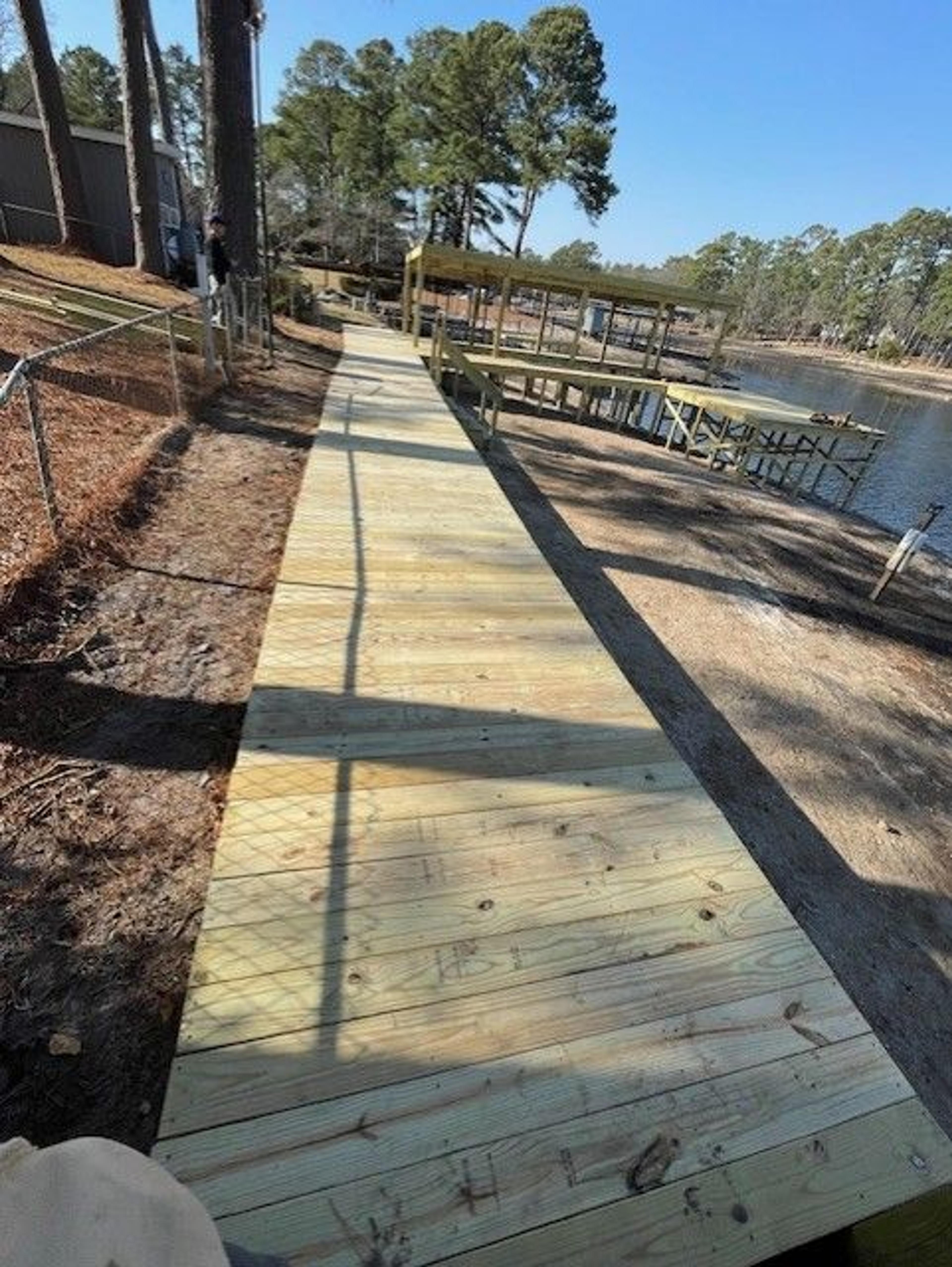 Shoreline Stabilization With Boardwalk And Boat Shelter