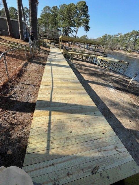 Shoreline Stabilization With Boardwalk And Boat Shelter