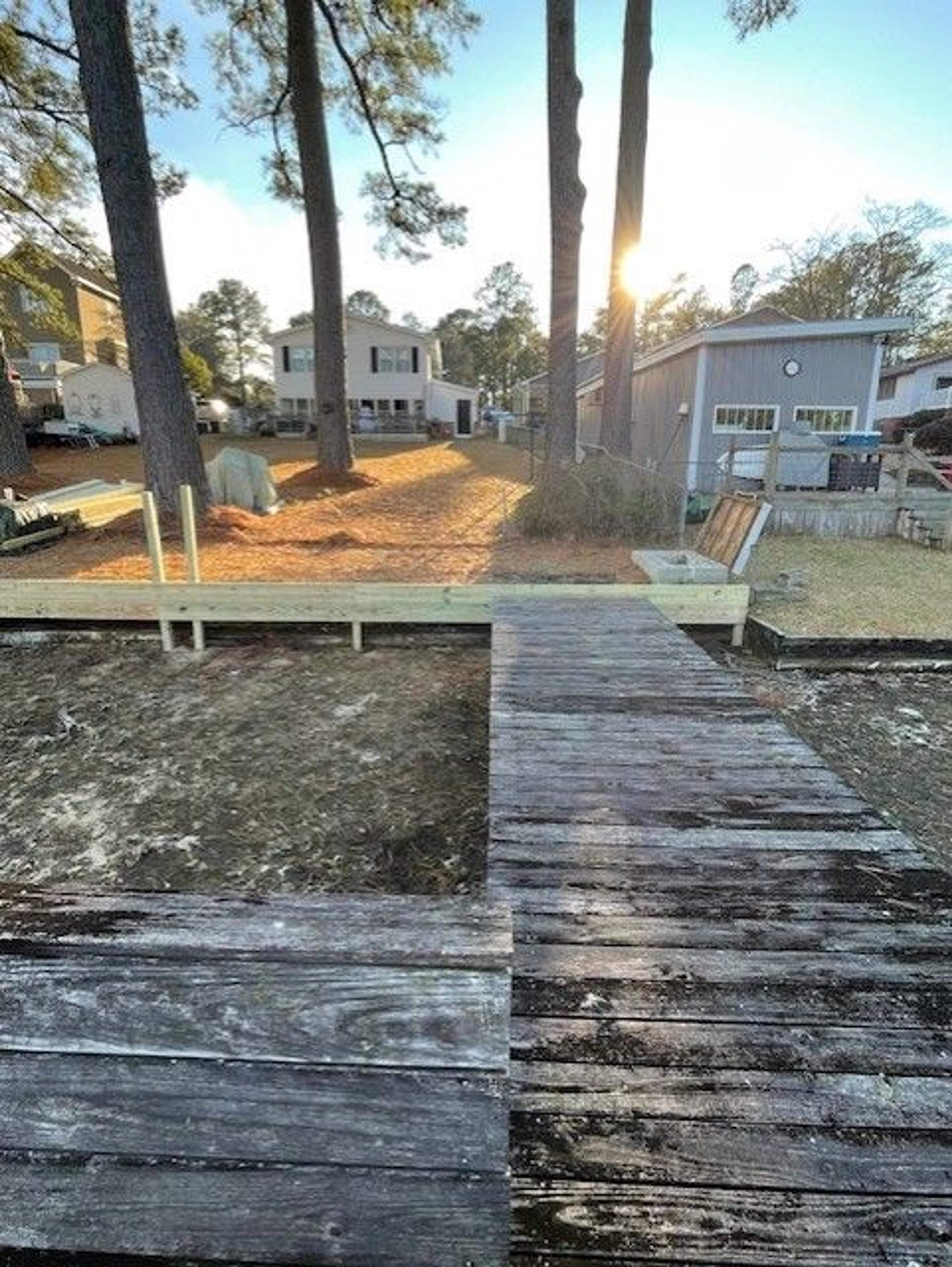 Shoreline Stabilization With Boardwalk And Boat Shelter