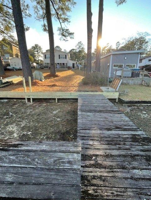 Shoreline Stabilization With Boardwalk And Boat Shelter