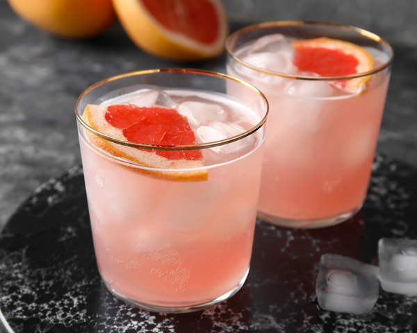 Apertif cocktail with a slice of grapefruit