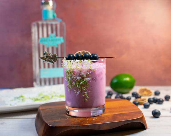 Glass with blueberry coconut drink