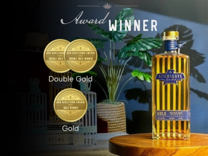 Bottle of Ameragave next to a Double Gold Medal and Gold Med