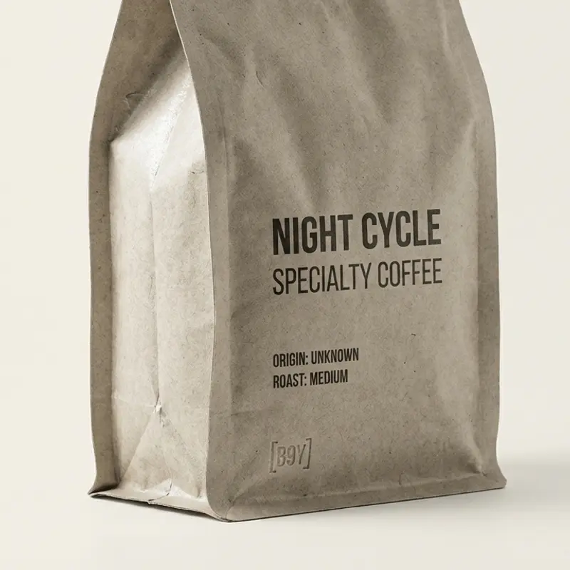 Photograph of a specialty coffee bag named 'Night Cycle' with a medium roast level.