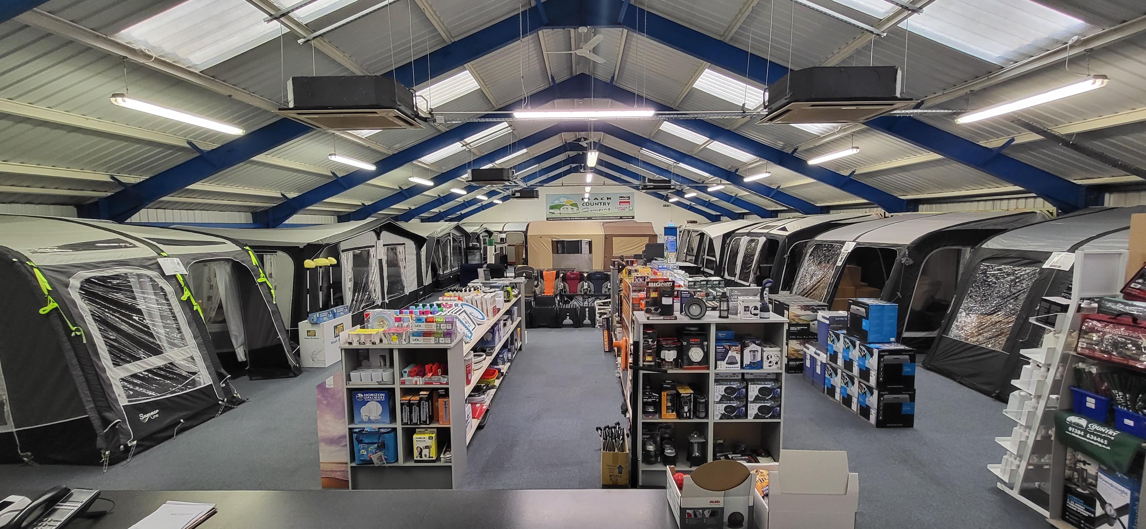 Open plan awnings showroom with awnings and camping chairs