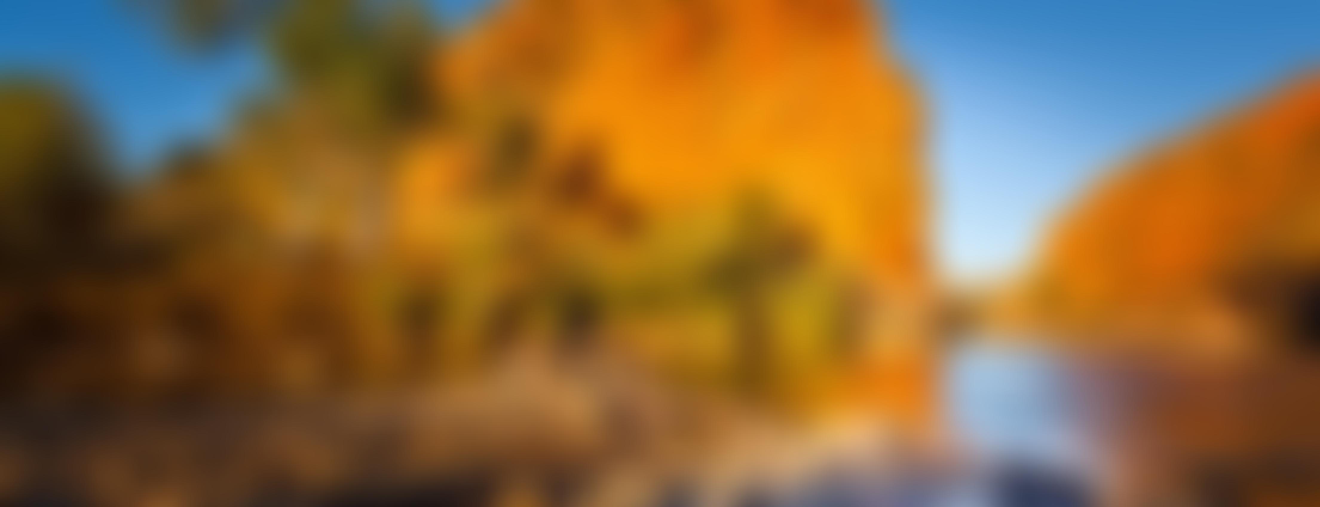 A river with rocky outcrops in the background