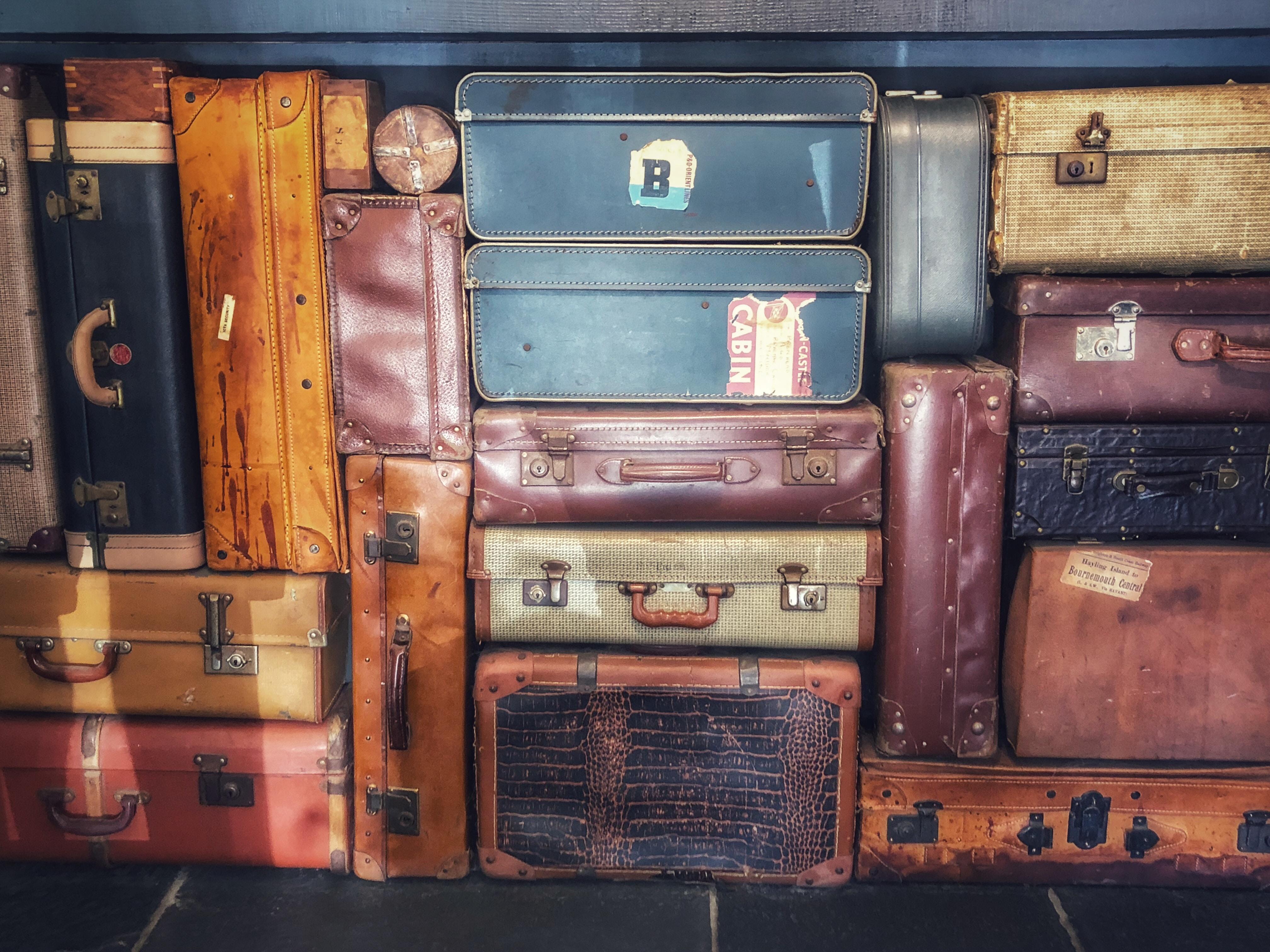 Retro style suitcases neatly stacked
