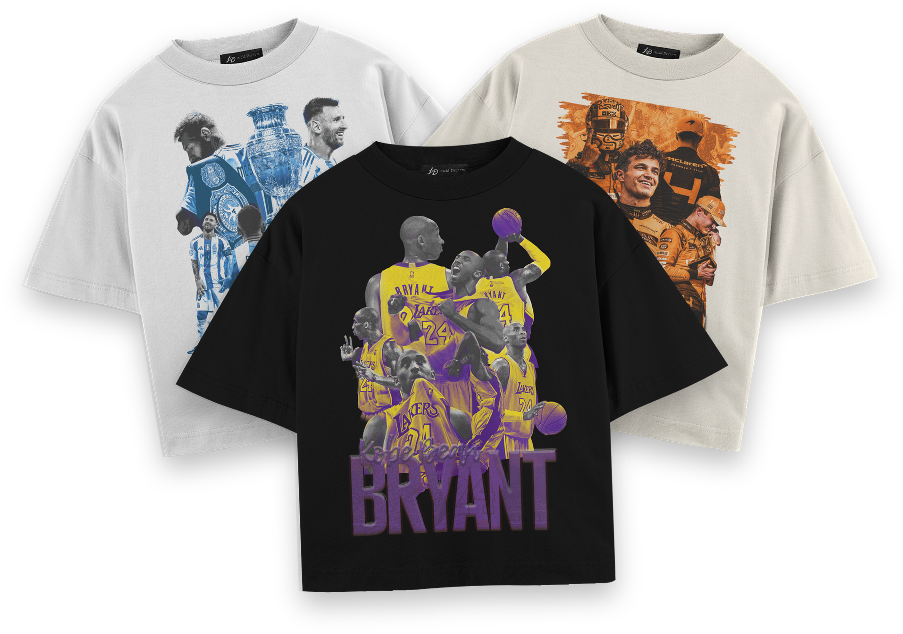 Three LD Custom tees in a pile: Kobe Bryant in Black in front, Lionel Messi in White and Lando Norris in Off White behind