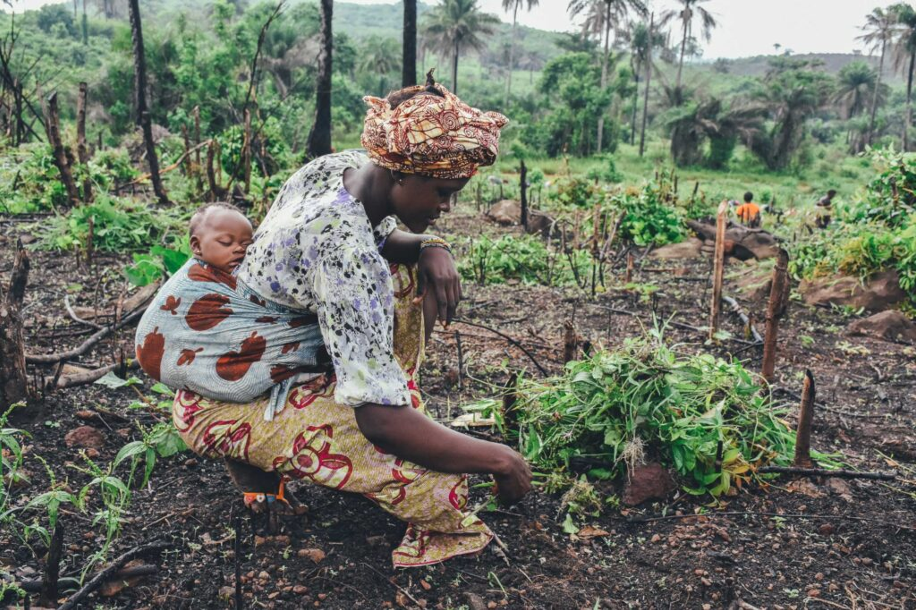 A picture of a rural woman with her child.