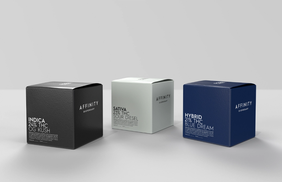 Packaging mockup for a dispensary brand called "Affinity" showing three boxes of black, white, and dark blue colors.
