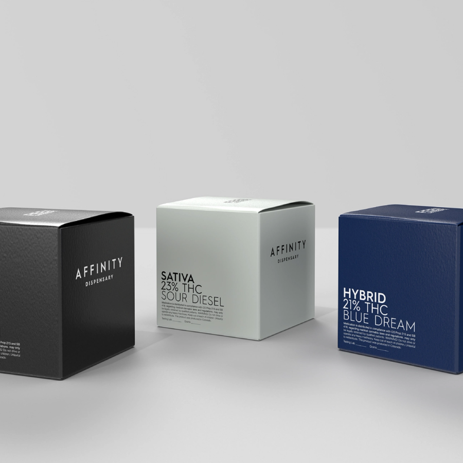 Packaging mockup for a dispensary brand called "Affinity" showing three boxes of black, white, and dark blue colors.
