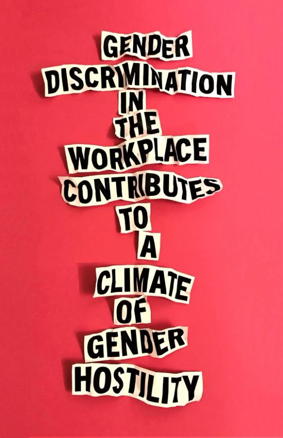 Poster with red background and text on scraps of paper: "Gender discrimination in the workplace contributes to a climate of gender hostility."