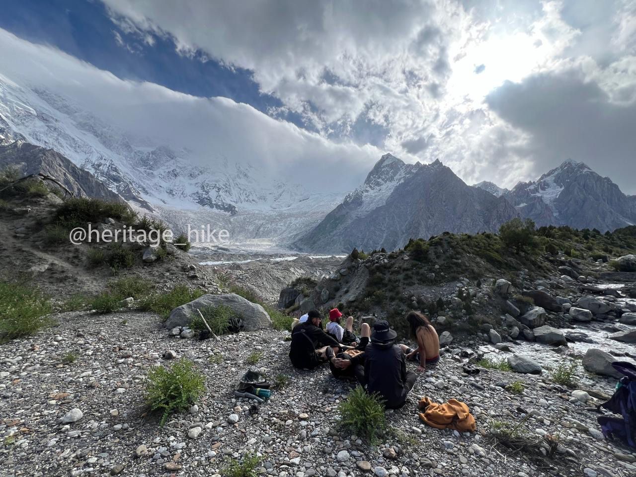 Tourists enjoying meal during Batura glacier Trek