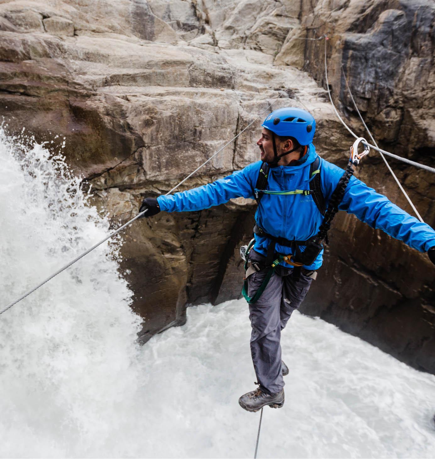 A guide crossing a suspension bridge