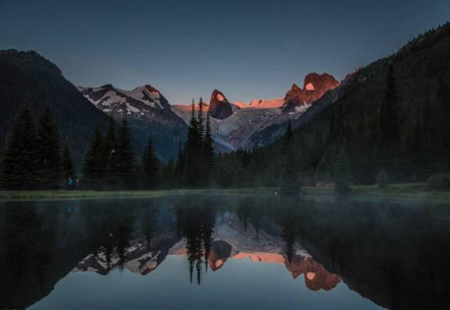 A mountain range at sunset