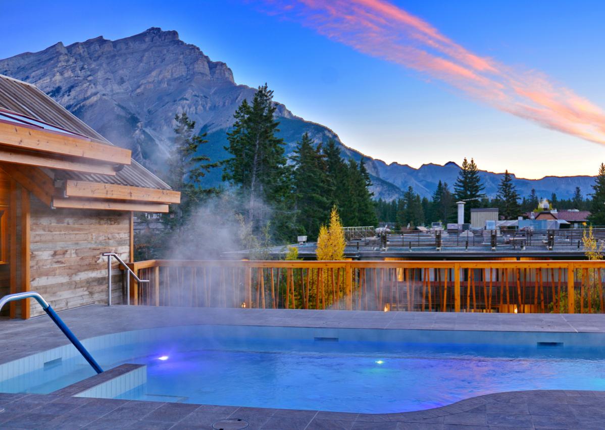 Lodge hot tub with mountains in the background