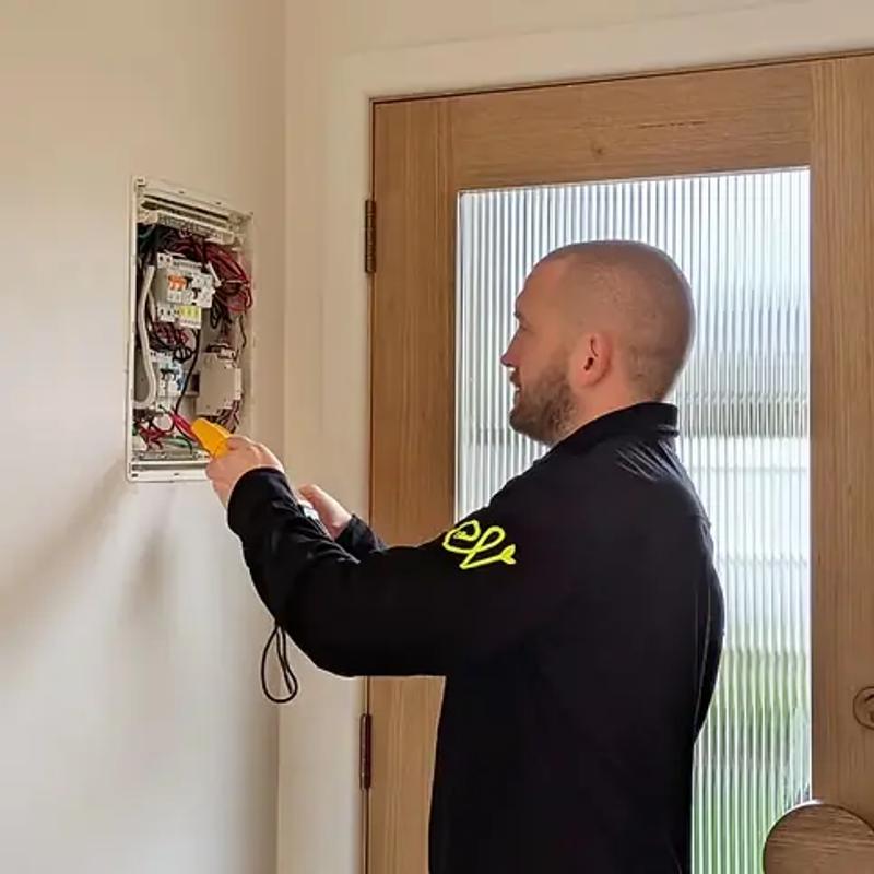 Revelectrical electrician testing a home switchboard