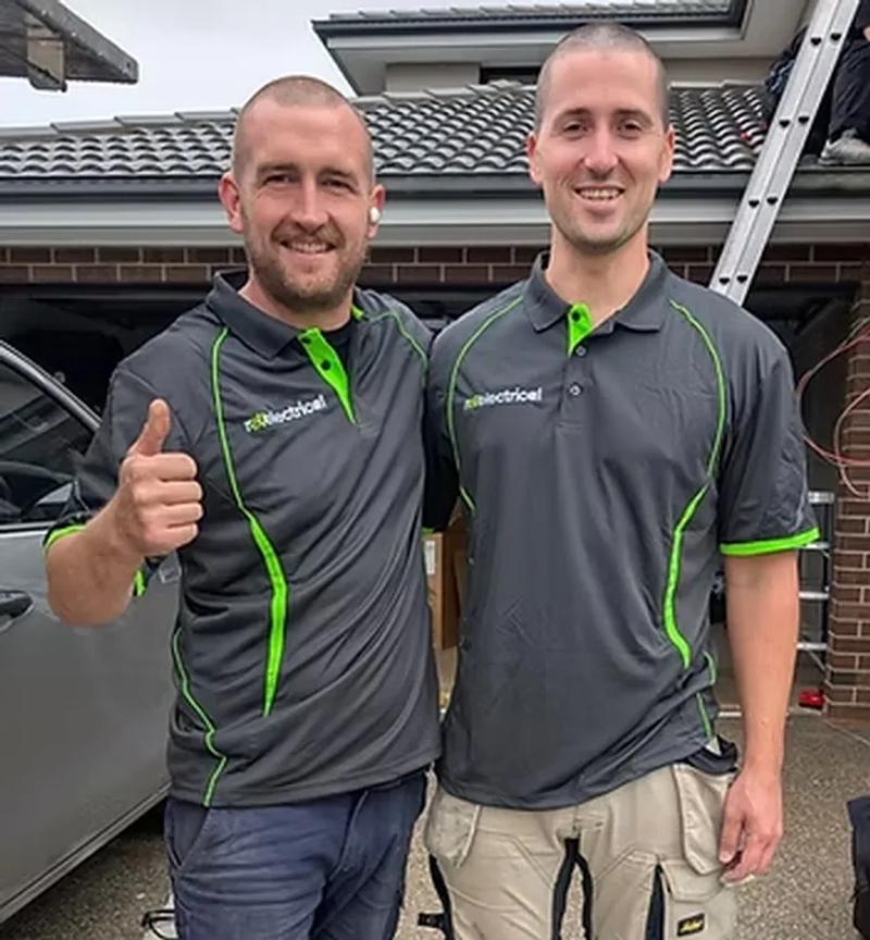 Two Revelectrical electricians on site in Melbourne