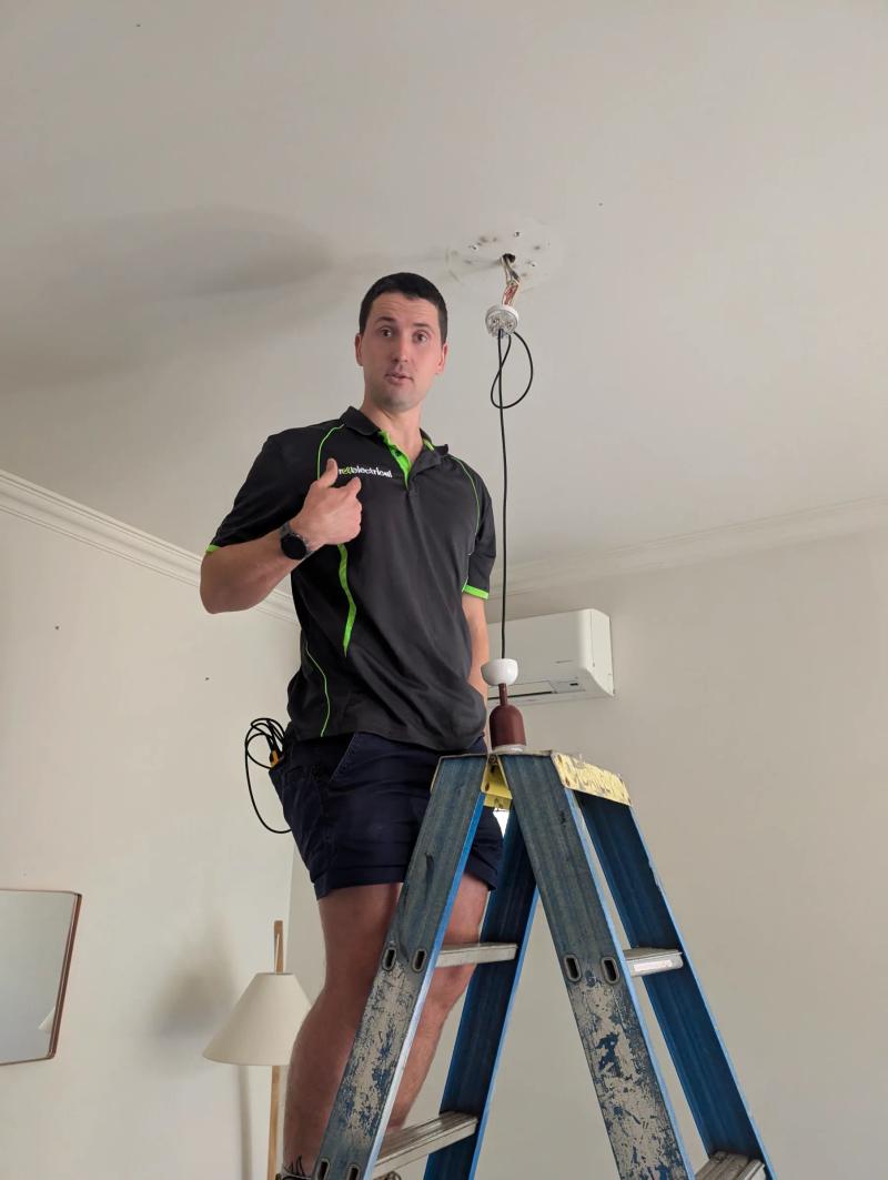 Revelectrical electrician installing LED downlights in a Melbourne home