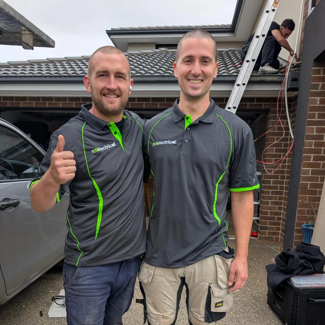 Two Revelectrical electricians on site in Melbourne