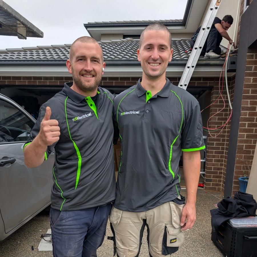 Two Revelectrical electricians on a job in Melbourne