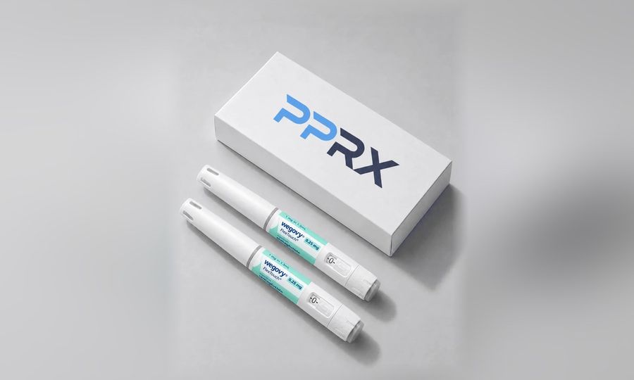 PPRX box with two Wegovy 0.25mg pens on a grey studio background