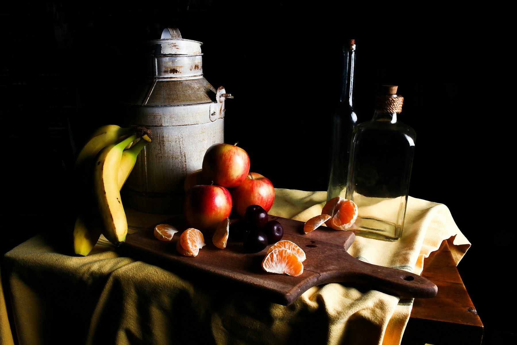 A wooden cutting board topped with fruit next to a bottle of wine