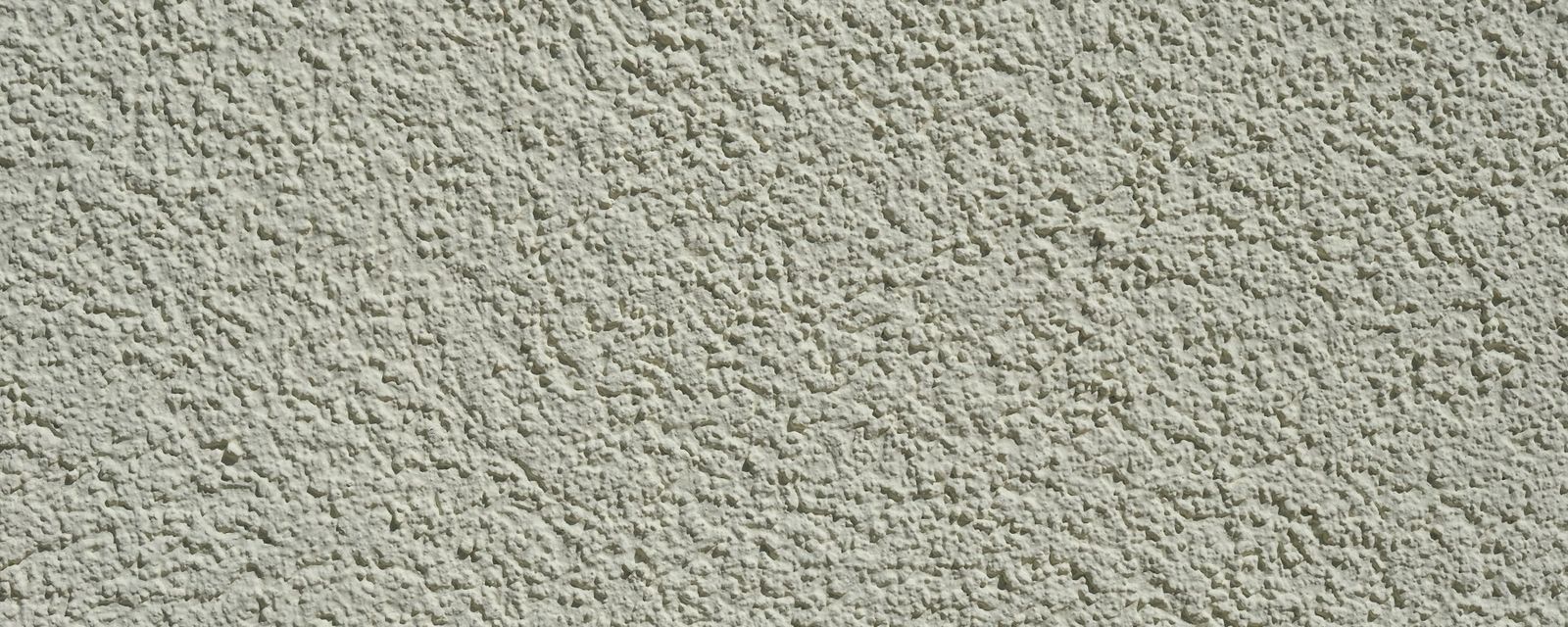 A close up of a wall made of cement