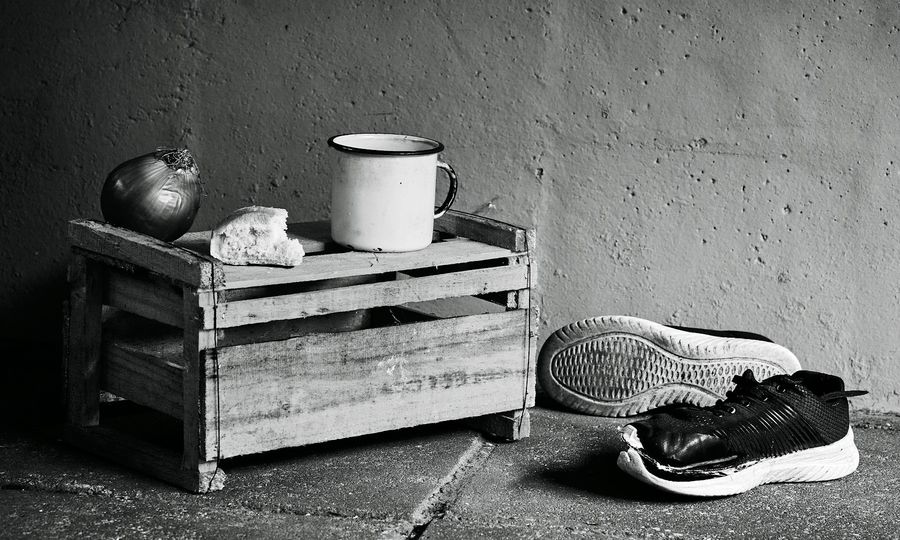 A black and white photo of a pair of shoes