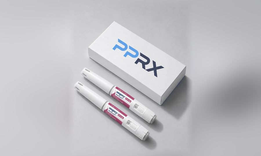 PPRX box with two Wegovy 0.5mg pens on a grey studio background