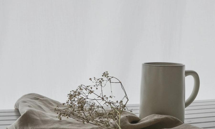 White ceramic mug on table