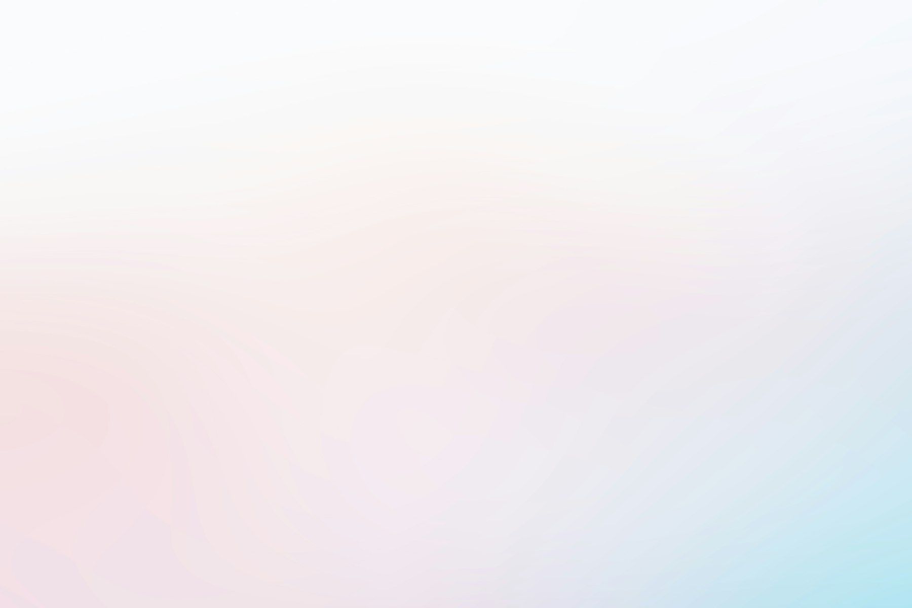 A blurry photo of a pink and blue background