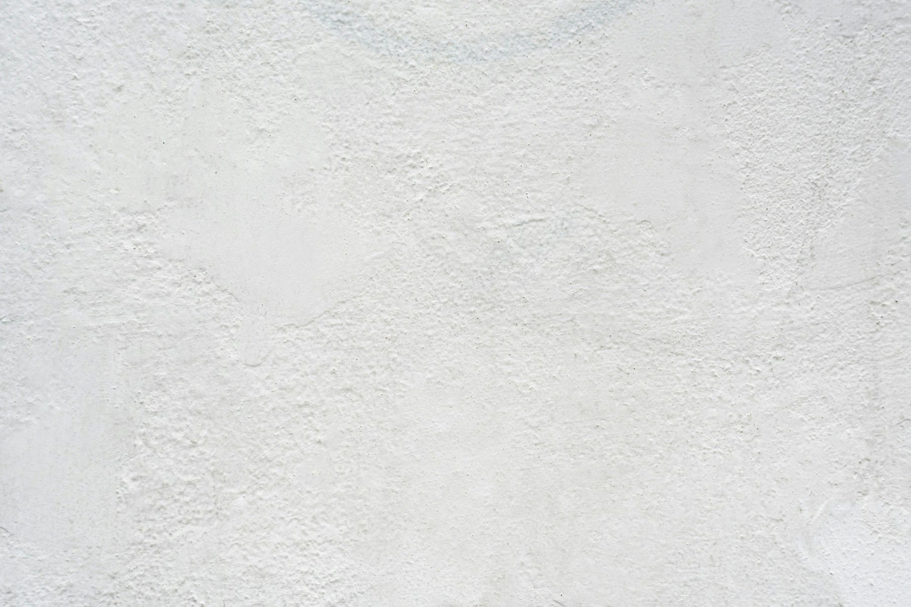 White textured plaster wall surface