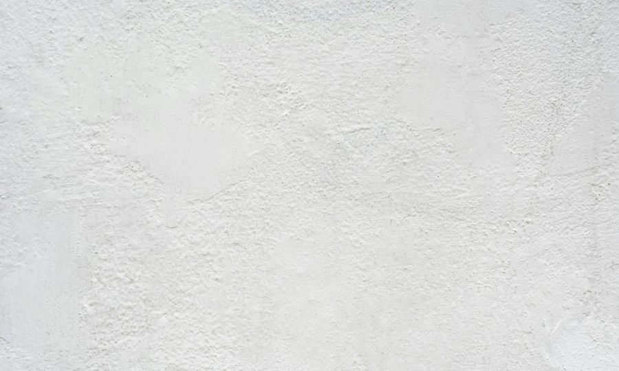 White textured plaster wall surface