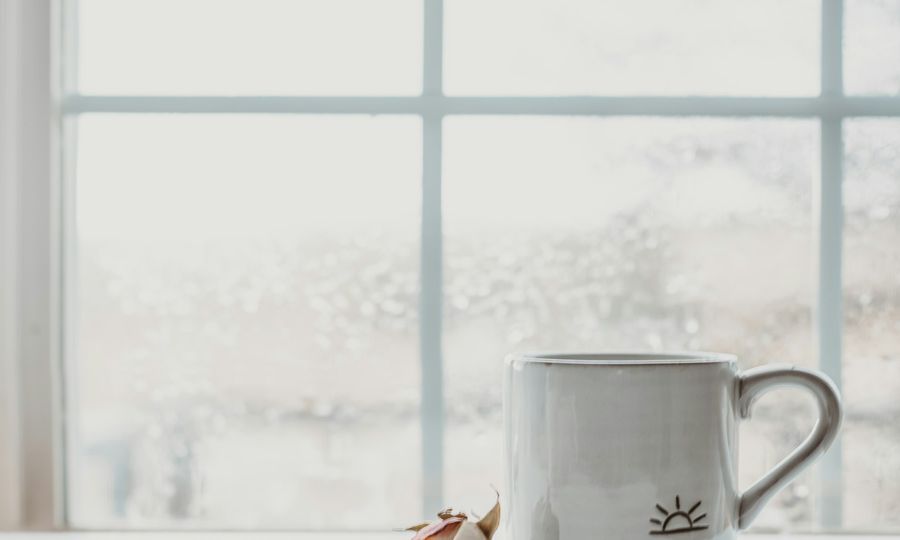 White ceramic mug on white table