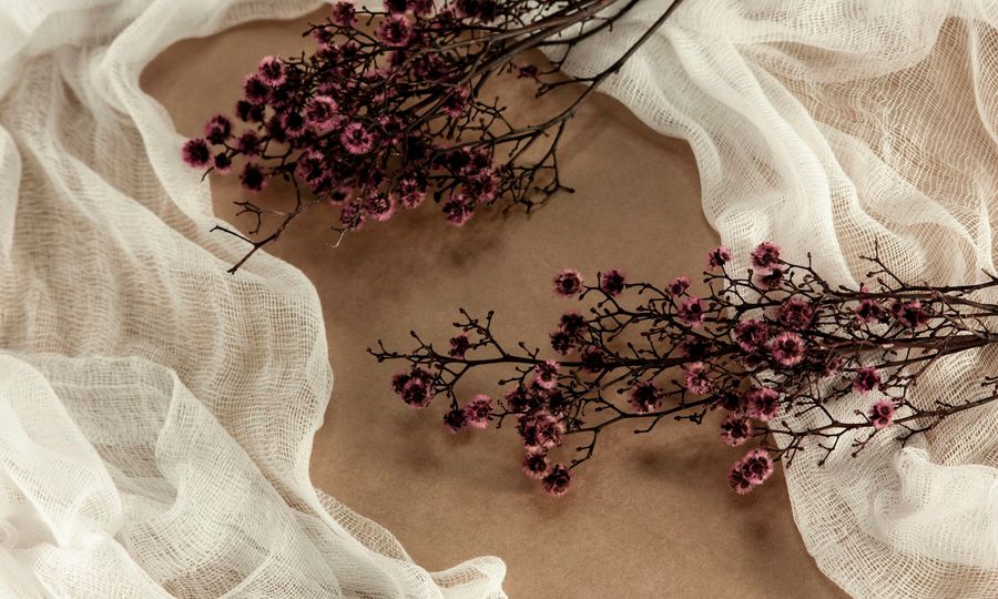 Purple flowers on blue textile