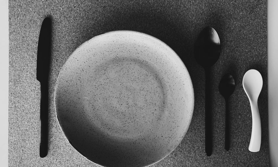 White ceramic plate and silver fork