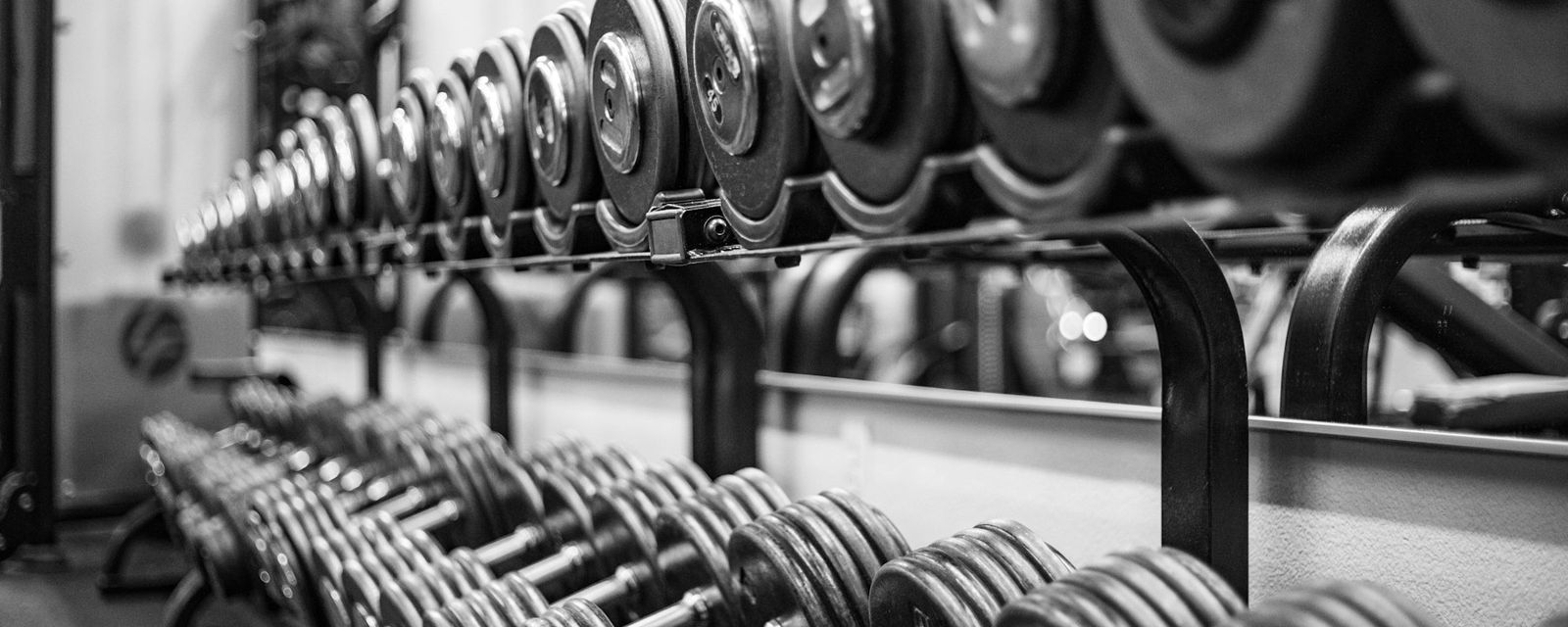Gray scale photo of dumbbells