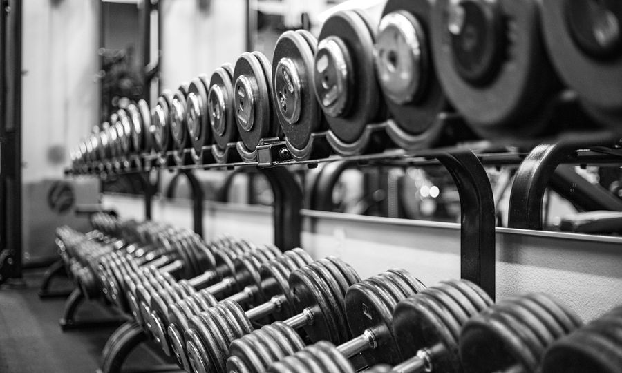 Gray scale photo of dumbbells