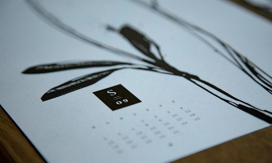 Black usb cable on white paper