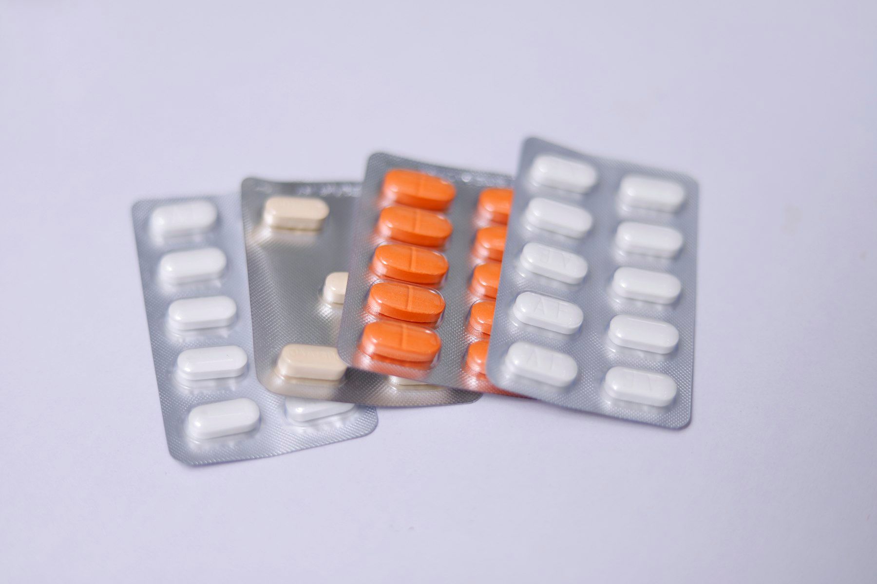 A couple of pills sitting next to each other
