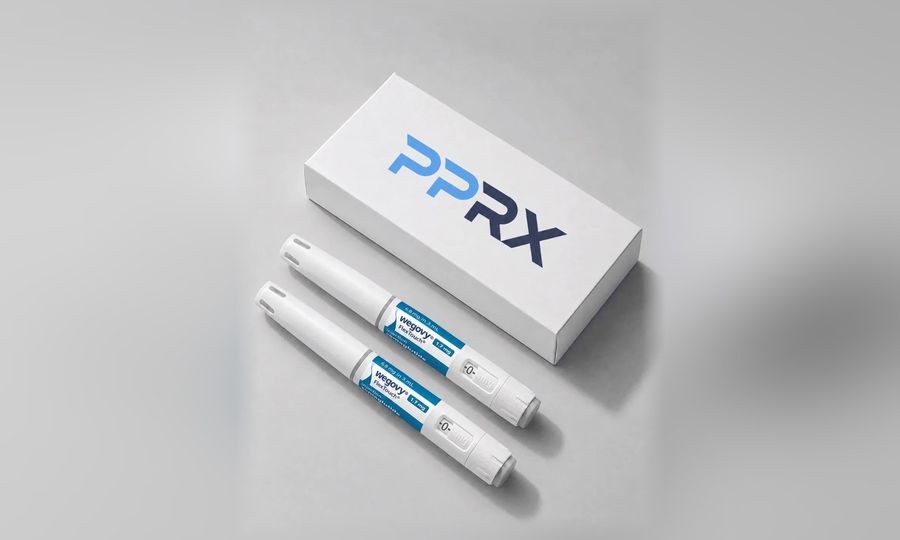 PPRX box with two Wegovy 1.7mg pens on a grey studio background