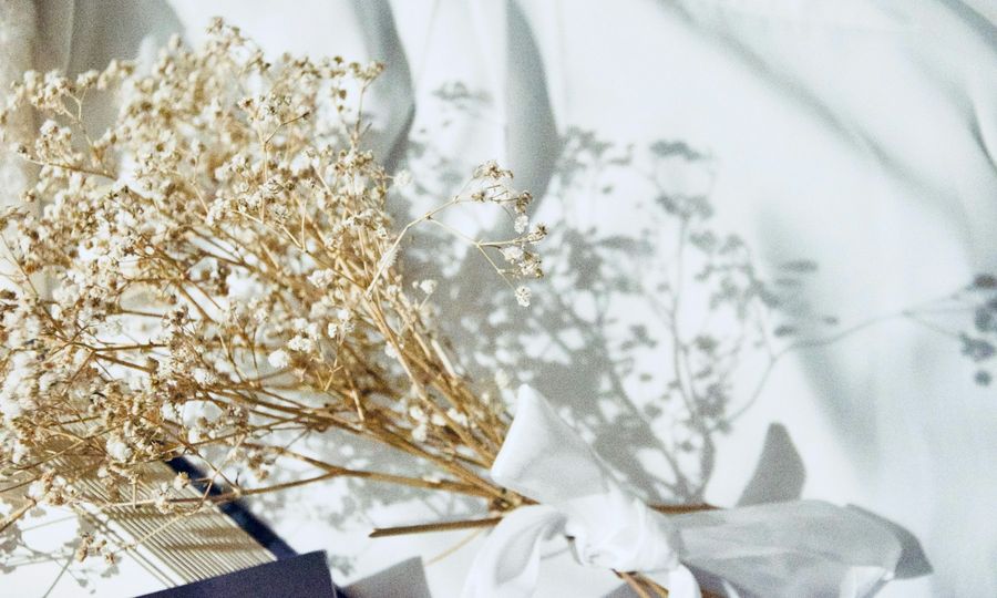 White flowers on white textile