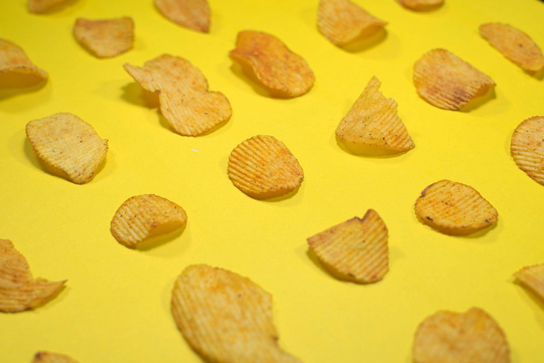 Brown cookies on yellow surface