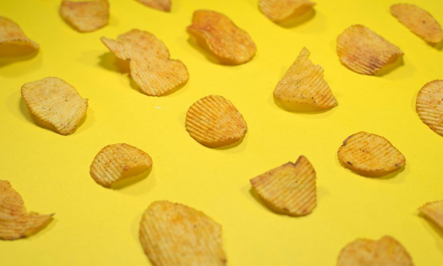 Brown cookies on yellow surface