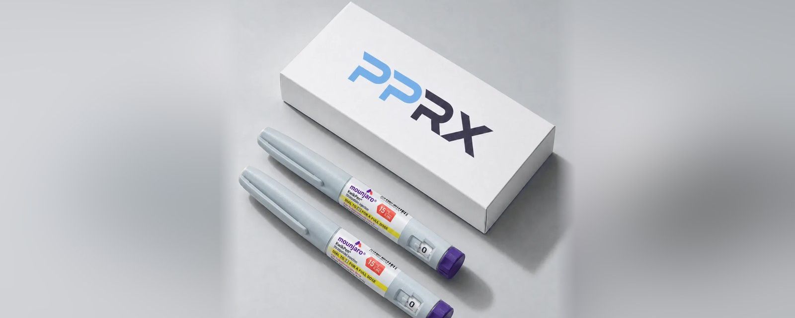 PPRX box with two Mounjaro 15mg pens on a grey studio background